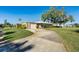 Charming home with a circular driveway and mature landscaping at 3289 Fairhaven Ln # 112, Sarasota, FL 34239