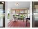 Cozy office space with an accent rug and large windows with views of backyard at 3289 Fairhaven Ln # 112, Sarasota, FL 34239