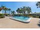 Sparkling community pool offering a refreshing escape in a serene setting at 3289 Fairhaven Ln # 112, Sarasota, FL 34239