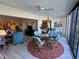 Bright sunroom with a cozy seating area and plenty of natural light at 3500 El Conquistador Pkwy # 357, Bradenton, FL 34210