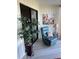 Inviting lanai with comfy recliner, stylish decor and sliding door to outside at 3500 El Conquistador Pkwy # 357, Bradenton, FL 34210