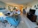 Bright living room featuring an open layout and stylish decor throughout at 3500 El Conquistador Pkwy # 357, Bradenton, FL 34210