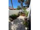 Charming brick patio, with colorful flower beds in a lush outdoor setting at 3500 El Conquistador Pkwy # 357, Bradenton, FL 34210