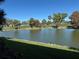 Scenic view of a serene pond on a lush green golf course at 3500 El Conquistador Pkwy # 357, Bradenton, FL 34210