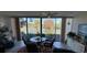 Bright sunroom with view of pond, blending indoor comfort with outdoor beauty at 3500 El Conquistador Pkwy # 357, Bradenton, FL 34210