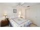Cozy bedroom featuring a ceiling fan and closet with sliding doors at 3708 Plumosa Ter, Bradenton, FL 34210