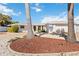 Charming single-story home featuring a well-manicured lawn, white exterior and spacious garage at 3708 Plumosa Ter, Bradenton, FL 34210