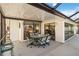 Covered patio area with outdoor dining set, perfect for enjoying meals outside at 3708 Plumosa Ter, Bradenton, FL 34210