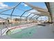 A screened in pool with canal views provides a relaxing outdoor space at 3708 Plumosa Ter, Bradenton, FL 34210