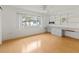 Bedroom featuring a built-in desk, shelving, and a bright window at 3908 Panola Ln # 193, Sarasota, FL 34232