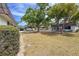 Exterior view of homes in a landscaped community with mature trees and well-maintained grounds at 3908 Panola Ln # 193, Sarasota, FL 34232