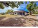 Well-maintained home with mature shade trees providing a park-like setting on a sunny day at 3908 Panola Ln # 193, Sarasota, FL 34232