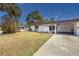 Charming home featuring a well-maintained lawn, carport, and inviting curb appeal in a desirable community at 3908 Panola Ln # 193, Sarasota, FL 34232
