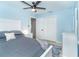 Comfortable bedroom featuring a large bed, closet, and white furniture at 3910 Cape Haze Dr, Rotonda West, FL 33947