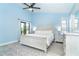 Bright main bedroom with plenty of natural light, fan, and a serene atmosphere at 3910 Cape Haze Dr, Rotonda West, FL 33947