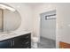 Modern bathroom with tiled walls, a walk-in shower, and stylish fixtures at 402 71St St, Holmes Beach, FL 34217