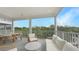 Spacious balcony featuring comfortable seating and scenic views of the surrounding landscape at 4305 Marina View Way, Cortez, FL 34215