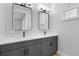 Modern bathroom with double vanities, sleek fixtures, and a bright, contemporary design at 4305 Marina View Way, Cortez, FL 34215