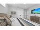 Bright bedroom showcasing a beach theme, closet, and a comfortable space at 4305 Marina View Way, Cortez, FL 34215