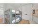 Cozy bedroom featuring bunk beds, offering a comfortable and space-efficient design at 4305 Marina View Way, Cortez, FL 34215
