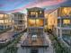 Stunning elevated home with a pool, deck, balconies, and picturesque sunset views at 4305 Marina View Way, Cortez, FL 34215