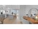 Open concept kitchen with modern appliances, center island and adjacent workspace at 4305 Marina View Way, Cortez, FL 34215