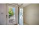 Bathroom shower and glass door view to the outside featuring greenery at 4420 Oak View Dr, Sarasota, FL 34232