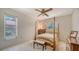 Bedroom with natural light from two windows, a four-post bed, and decor at 4420 Oak View Dr, Sarasota, FL 34232