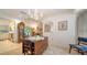 Dining room with chandelier lighting with views to the living room and kitchen at 4420 Oak View Dr, Sarasota, FL 34232