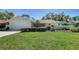 Charming single-story home with a well-manicured lawn and a two-car garage at 4420 Oak View Dr, Sarasota, FL 34232