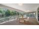 Relaxing screened lanai offering a serene outdoor space perfect for dining or lounging at 4420 Oak View Dr, Sarasota, FL 34232