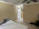 Spacious bedroom with tiled floor, ceiling fan, and ample natural light, and neutral colored paint at 4431 W Wallace Ave, Tampa, FL 33611
