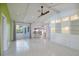 Living room has a screened patio and updated kitchen nearby at 4662 Long Lake Dr, Sarasota, FL 34233