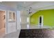 Open living room with bright accent wall, seamless for entertaining at 4662 Long Lake Dr, Sarasota, FL 34233