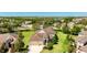 Aerial view of well maintained single Gathering home with landscaped yard and attached two car garage at 4706 Balboa Park Loop, Bradenton, FL 34211
