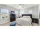 Neutrally decorated bedroom featuring a queen bed, matching nightstands, and windows for natural light at 4706 Balboa Park Loop, Bradenton, FL 34211