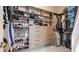 Walk-in closet with custom shelves and ample storage space for clothes and shoes at 4706 Balboa Park Loop, Bradenton, FL 34211