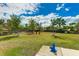 Community dog park featuring green space and a doggie water fountain and bowl for furry friends to enjoy at 4706 Balboa Park Loop, Bradenton, FL 34211