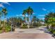 Gated entrance to the community with lush landscaping and a secure entry point for residents and guests at 4706 Balboa Park Loop, Bradenton, FL 34211