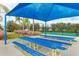 Shaded picnic tables offer a relaxing spot for outdoor meals and community gatherings near green spaces at 4706 Balboa Park Loop, Bradenton, FL 34211
