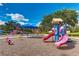 Well-maintained playground with diverse play structures, shaded areas, and safety surfaces for  at 4706 Balboa Park Loop, Bradenton, FL 34211