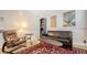 Cozy bedroom with a leather couch and a small table, perfect for relaxing at 4922 Commonwealth Dr, Sarasota, FL 34242