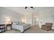Bedroom with carpet, a ceiling fan and plenty of natural light at 4922 Commonwealth Dr, Sarasota, FL 34242