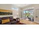 Inviting living room with sliding doors and outdoor porch access to view the pool at 4922 Commonwealth Dr, Sarasota, FL 34242