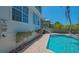 Stunning pool view with brick pavers, outdoor shower, and a serene backyard ambiance at 4922 Commonwealth Dr, Sarasota, FL 34242