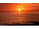 Gorgeous sunset with vibrant colors reflected on the tranquil water creating a serene and picturesque scene at 4922 Commonwealth Dr, Sarasota, FL 34242