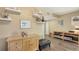 Cozy living room with built-in shelving and views into other living areas at 5078 Marsh Field Rd # 82, Sarasota, FL 34235