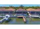 Waterfront homes with screened lanais, boat docks, and boat lifts, offering serene coastal living with water access at 510 16Th E Ave, Palmetto, FL 34221