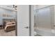 Stylish bathroom featuring a shower-tub combo with a white shower curtain and a neutral color palette at 510 16Th E Ave, Palmetto, FL 34221