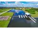 Aerial view of community boat slips and boat storage area on the water at 510 16Th E Ave, Palmetto, FL 34221